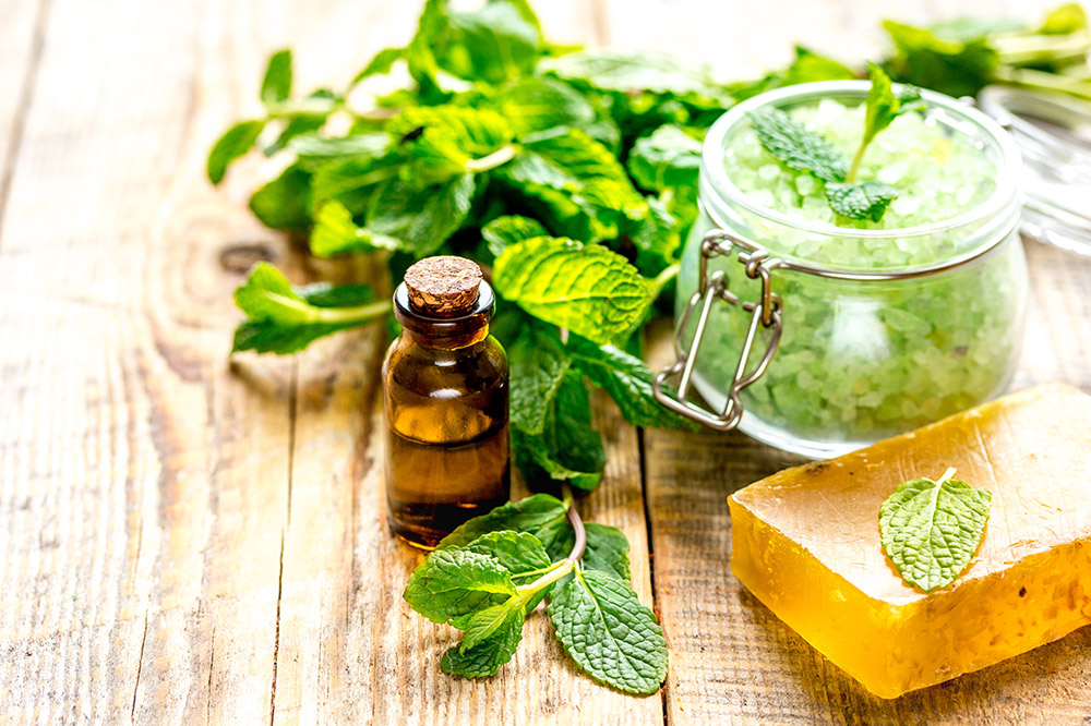 pure peppermint essential oil with soap and facial scrub for Mother’s Day