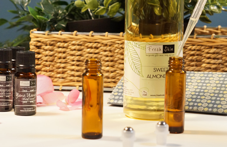 adding carrier oil to roller ball bottle