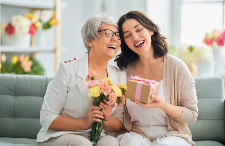 Mum receiving flowers for mothers day